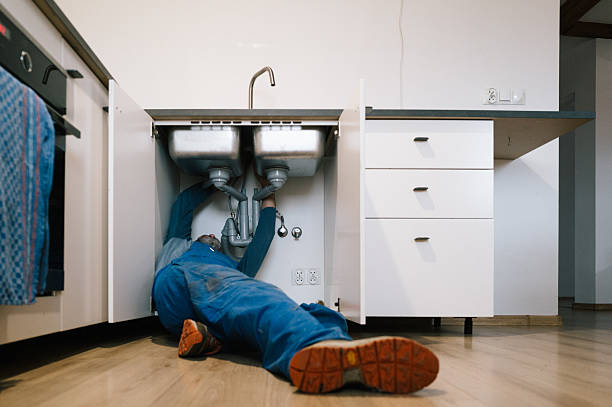 Professional Drain Cleaning technician working in Felda, FL